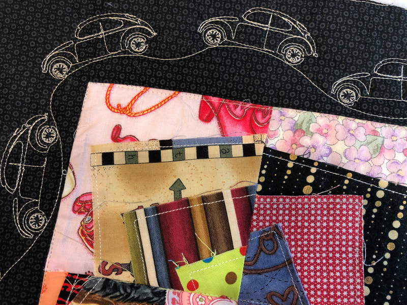 Classic VW Bugs on the border of a crazy quilt, machine quilted by Amy Martin of Peaceful Quilts in Lafayette Indiana