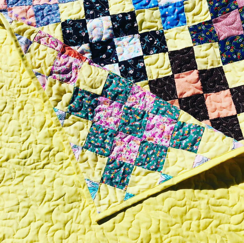 A classic quilt, machine quilted by Amy Martin of Peaceful Quilts in Lafayette Indiana