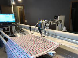 Whole cloth quilt on an Innova longarm quilting machine